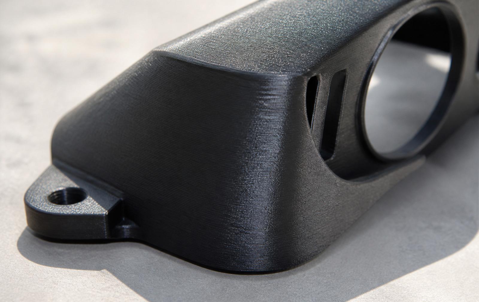 ASA part — matte black automotive housing with fine texture